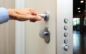 someone opening a security door